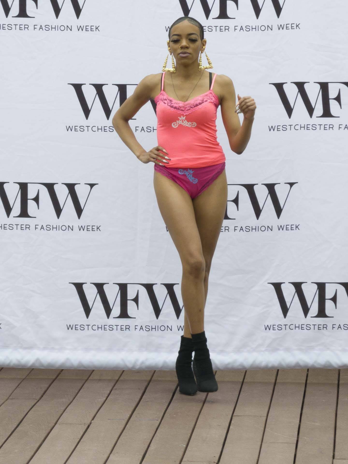 a photo of a lady at westchester fashion week