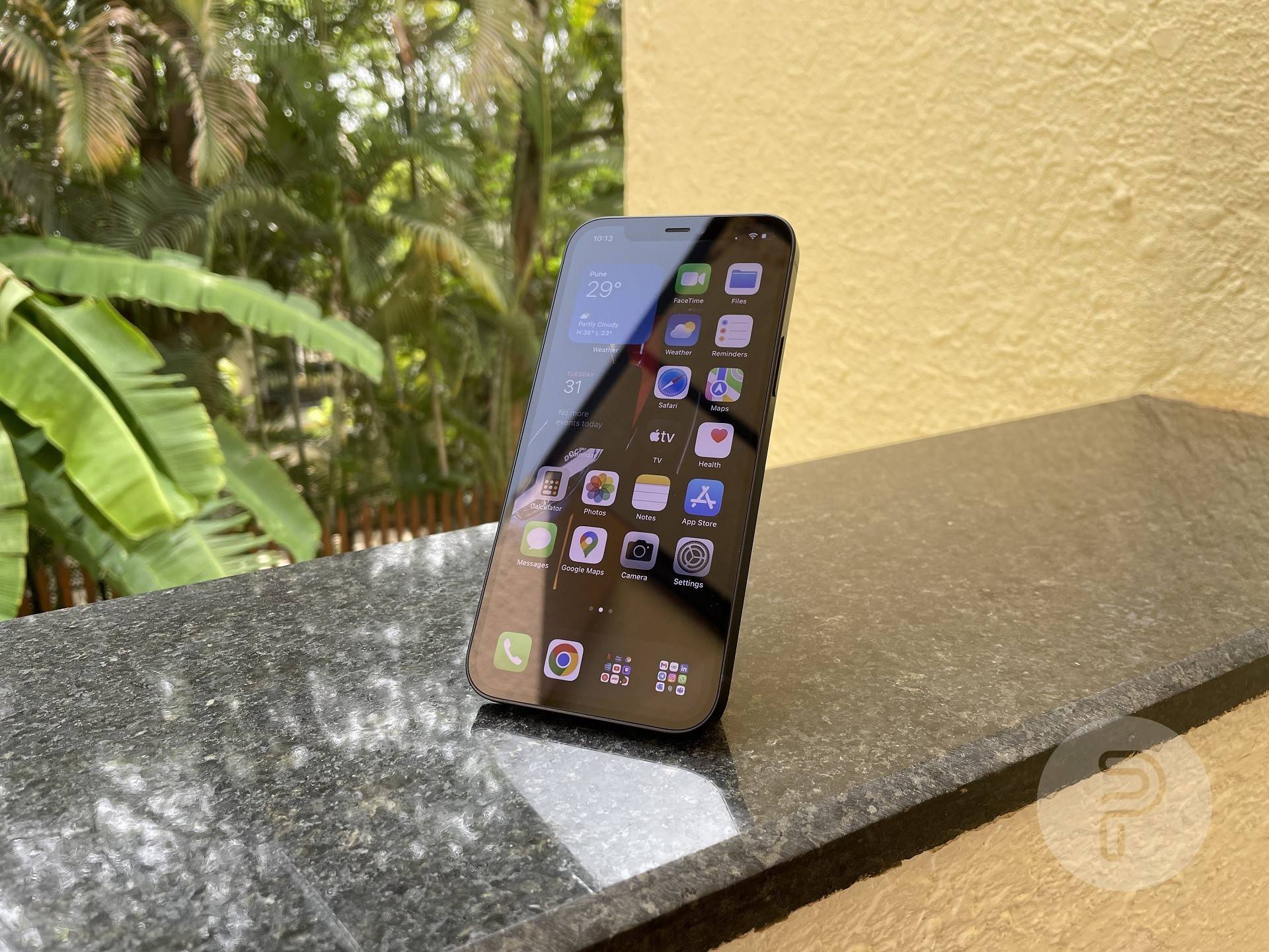 moft snap-on phone stand holding up an iPhone in portrait mode at a slight angle