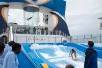 On the upper deck right at the front of the ship is a surfing simulator and a vertical wind tunnel skydiving simulator.