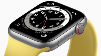 Apple watch with yellow band and clock on the screen