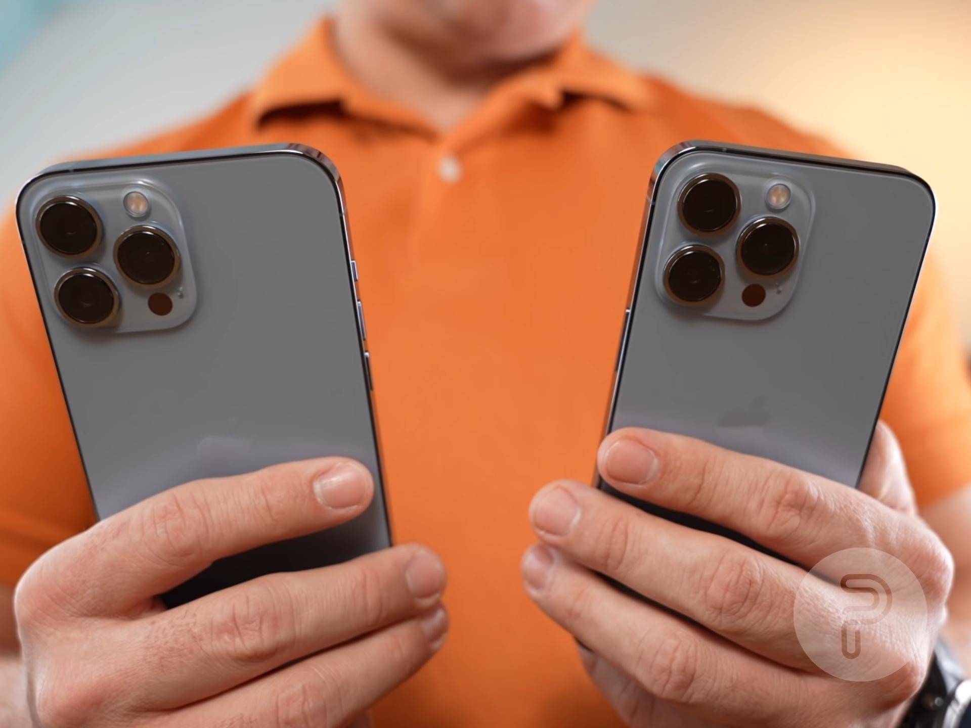 iPhone 13 Pro and iPhone 13 Pro Max held side by side