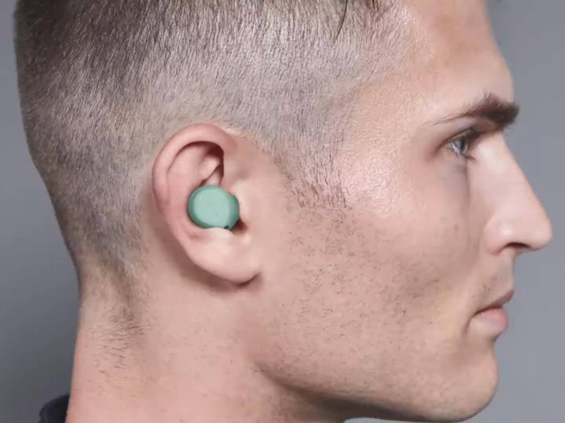 jabra elite 7 active placed in the ear of a user